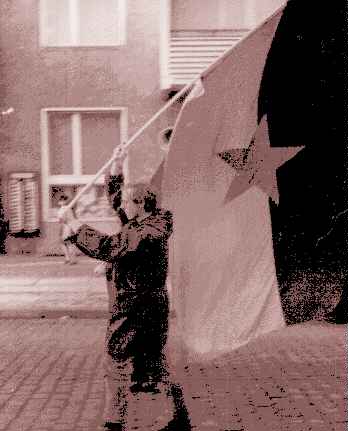 Flag bearer leads the way.